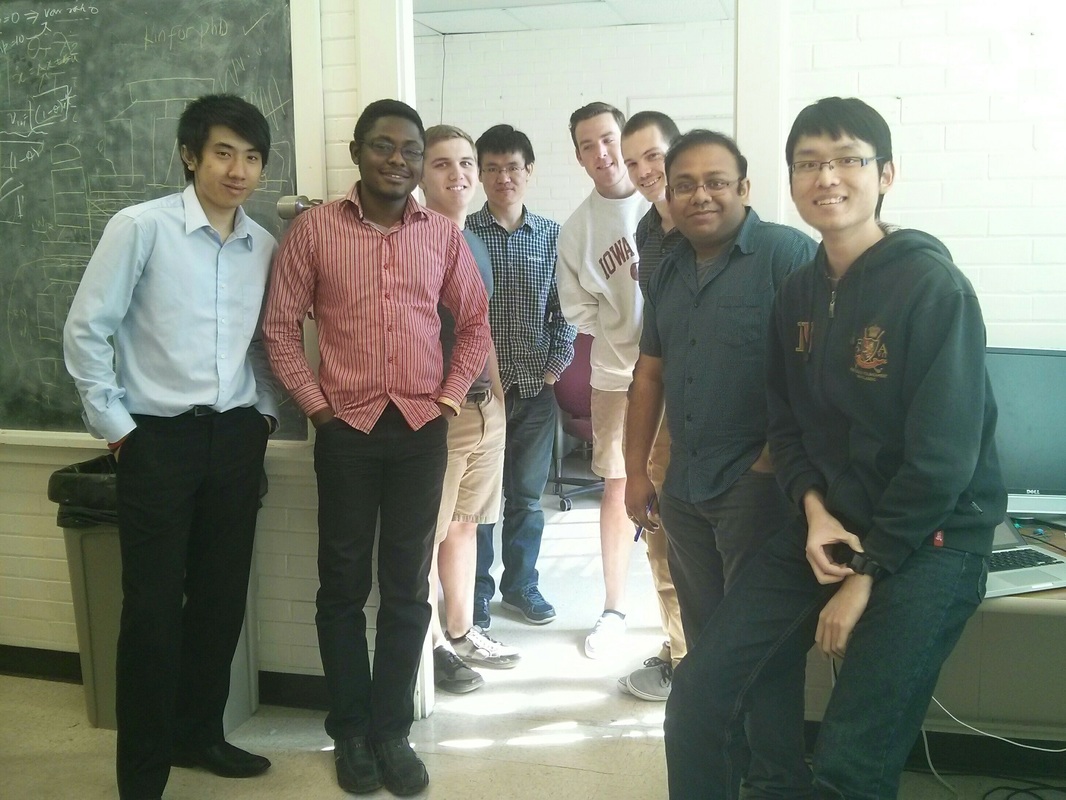 Lab group photo indoors (home page section background)